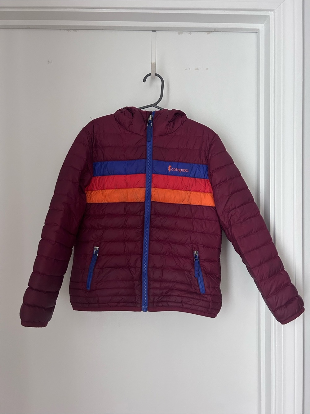 cotopaxi Maroon Kids Puffer Jacket with Blue and Orange Stripes